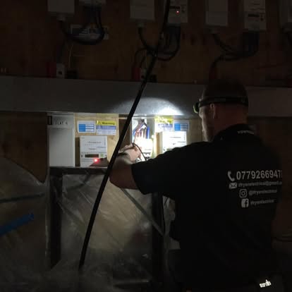 Tom Fryer working at a consumer unit